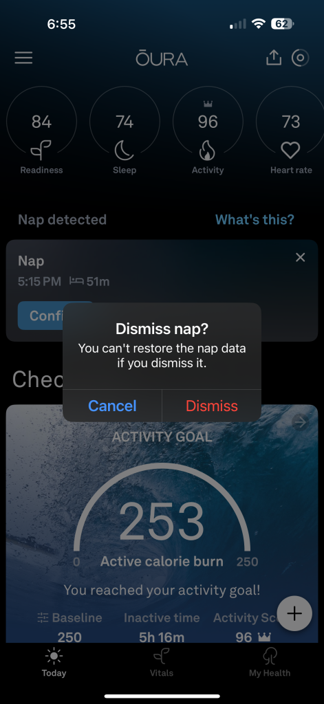 Screenshot of a health app, compatible with the Oura Ring, displaying readiness, sleep, and activity scores. A notification about dismissing nap data pops up over progress toward an activity goal with 253 active calories burned.