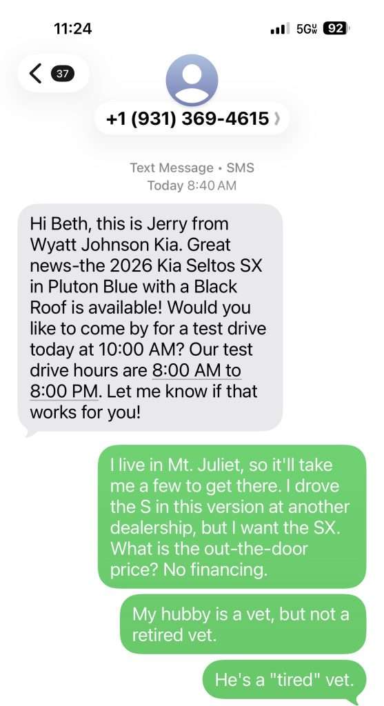 Screenshot of a text conversation about scheduling a Kia Seltos test drive with AI Customer Service, followed by a reply discussing driving to the location and clarifying the husband's status as a “tired” vet, not retired.