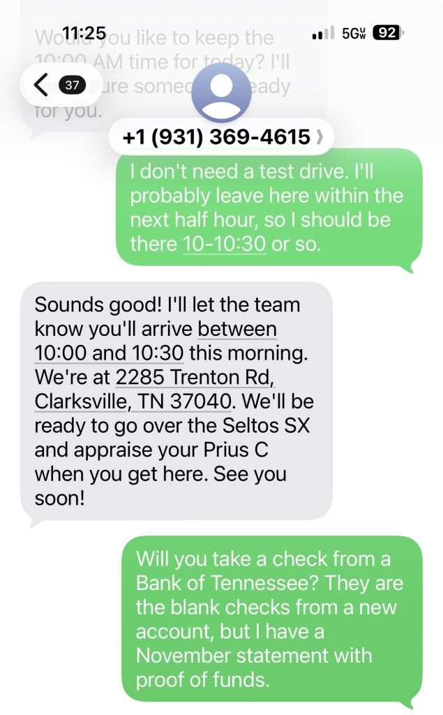 A text message conversation with AI Customer Service arranging a test drive at a car dealership, including the address and a question about paying with a check from a Tennessee bank.